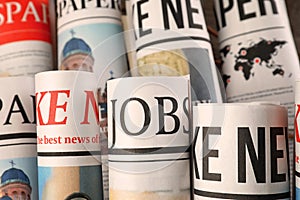 Rolled newspapers, closeup