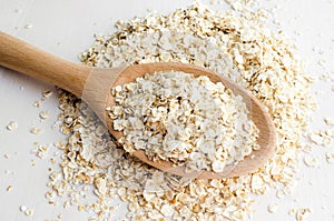 Rolled oats in big spoon photo