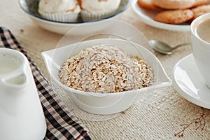 rolled oats in a bowl on a table