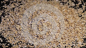 Rolled oats close up rotation loopable slow motion video