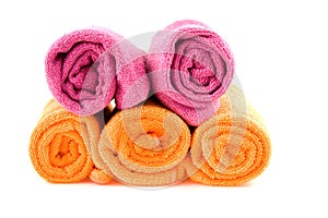 Rolled orange and pink towels