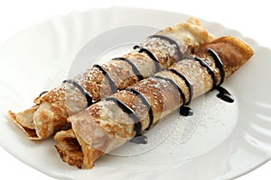 Rolled pancakes with chocolate