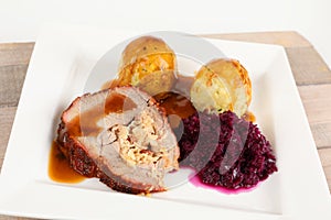 Rolled roast with side dishes