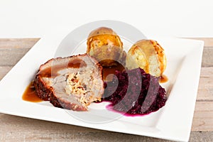 Rolled roast with side dishes
