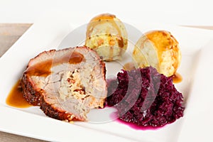 Rolled roast with side dishes