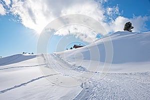 Rolled ski piste in the rofan mountains