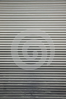 Rolled Steel Shutter Door Texture Background . Vertical shot