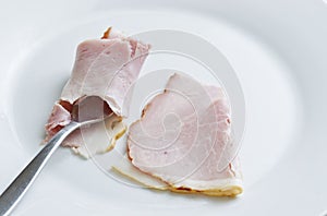 Rolled sugar ham on white