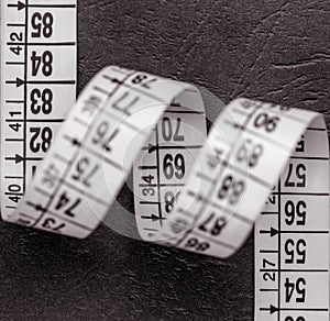 Rolled tailor's meter photo