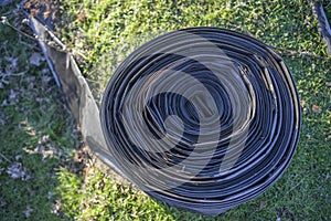 Rolled tape of flexible irrigation tubing system photo