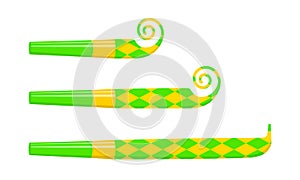 Rolled and unrolled party noise makers, blowers, sound whistles isolated on white background. Side view. New year