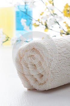 Rolled up beige towel