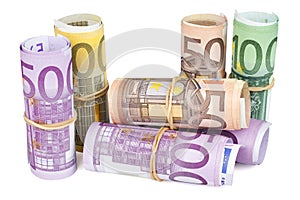 Rolled up Euro banknotes on white background