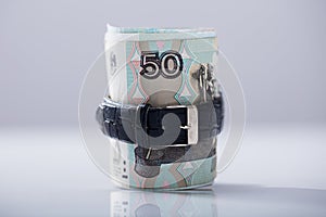 Rolled Up Russian Rubles Tied With Belt photo