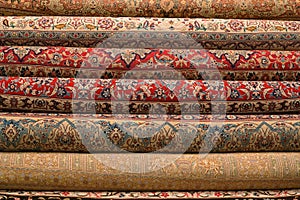 Rolled-up turkish or persian carpets