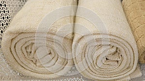 Rolled Up White and Brown Bath Towels
