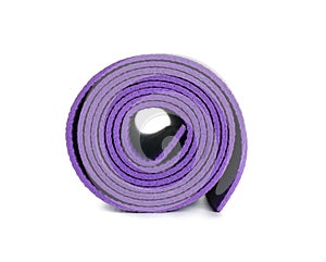 Rolled yoga mat on white background