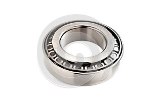 roller bearing on a white background close-up, blur as an artistic device, place for copy space