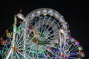 Roller coaster night time lighting celebration festval