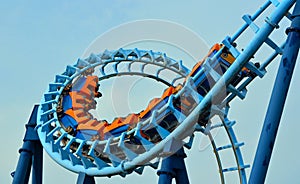 Roller coaster ride filled with thrill seekers