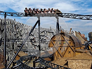Roller coaster ride Taron in themed world Klugheim