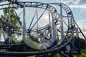 Roller coaster silhouette in evening
