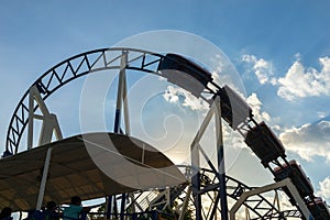 Roller coaster silhouette in evening