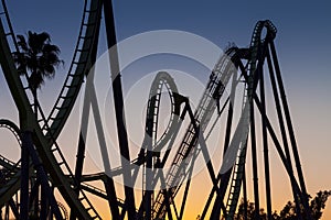 Roller coaster at sunset