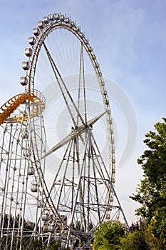 Roller coaster track and ferris wheel