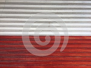 Roller door white and red color, shutter door texture background.