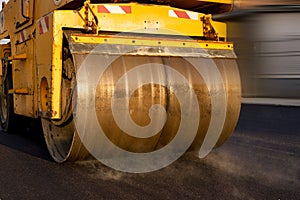 Roller paving the asphalt road