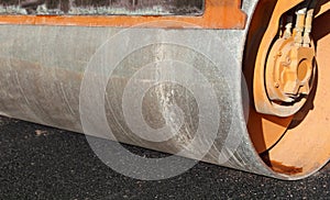 roller and the black asphalt of the new road photo