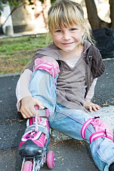 Roller skater - child girl - in protective equipment si