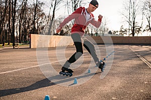 Roller skater, trick exercise in park
