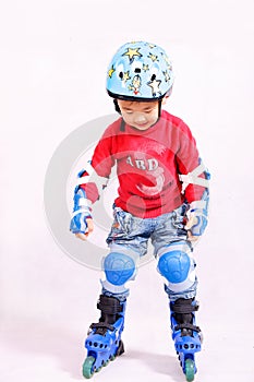 Roller skating boy moving forward