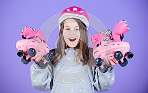 Roller skating teen hobby. Joyful teen going skating. Sporty teen girl. Girl cute teen wear helmet and roller skates on