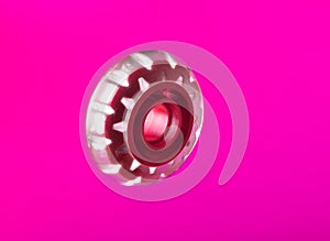 Roller wheel isolated on pink