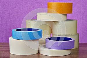 Rollers Scotch tape for various purposes in general heap.