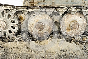 Rollers and track of a large self-propelled machine