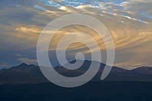 Rolling clouds above mountains before sunset, Aoraki Mount Cook National Park, New Zealand