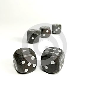 Rolling dices on white background