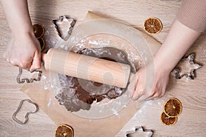Rolling dough, baking gingerbread men, making christmas gingerbread cookies, cookie cutting, homemade traditional christmas