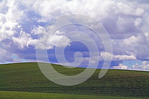 Rolling Farm Fields and Clouds