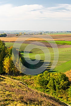 Rolling Hills in Polish Coutryside with Farm Fields at Fall Season