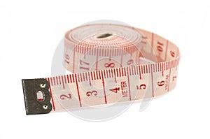 Rolling out measuring tape, on its side