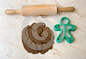 Rolling pin, cookie dough, and cutter