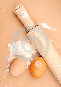 Rolling pin, eggs and flour.