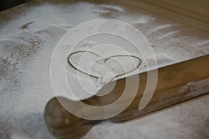 Rolling pin and heart made of flour