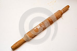 Rolling pin on the table with flour