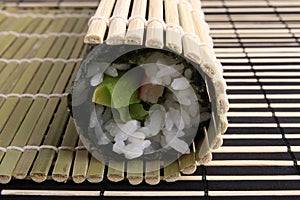 Rolling sushi maki